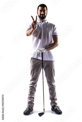 Golfer man doing victory gesture