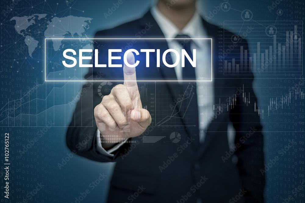 Businessman hand touching SELECTION button on virtual screen Businessman hand touching SELECTION button on virtual screen