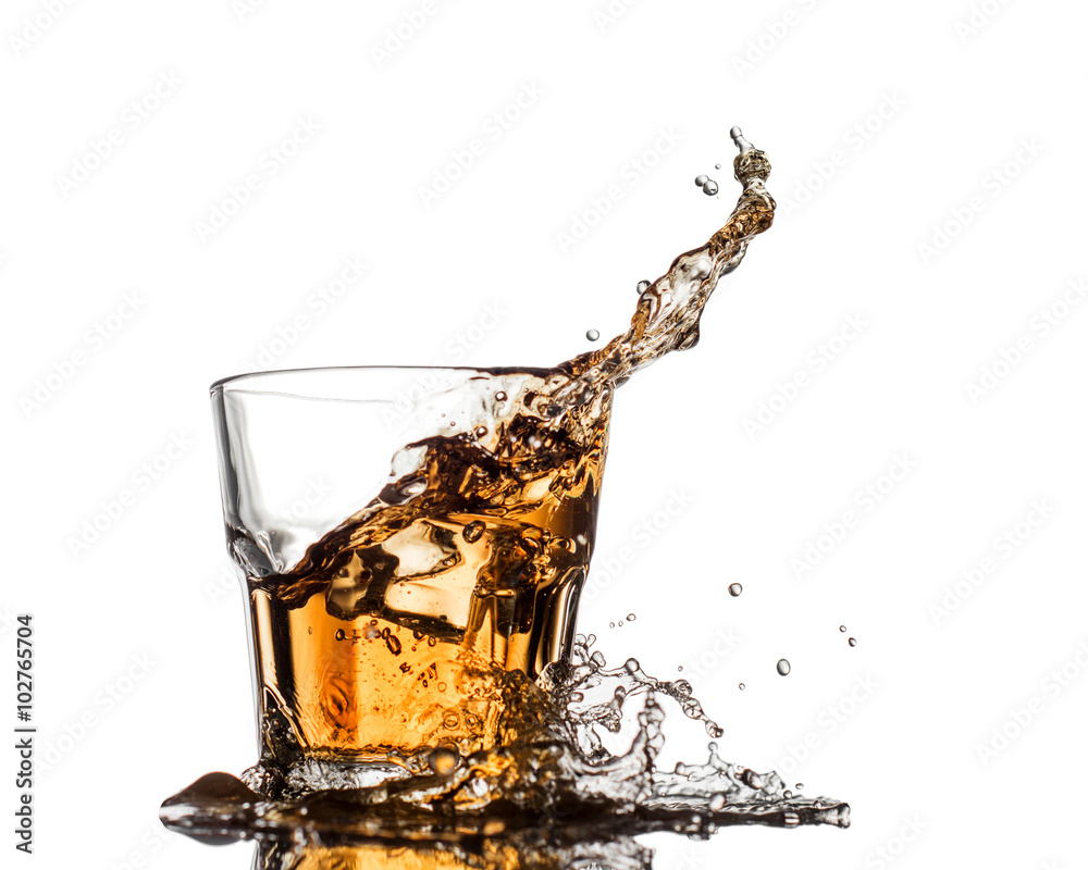 Whiskey Splash With Ice Cubes Isolated On White Stock Photo