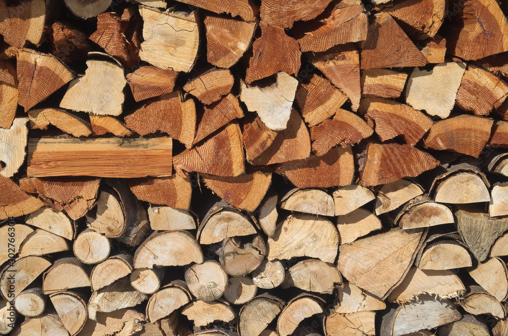 Pile of wood for the fireplace, background
Pile of wood for the fireplace, background