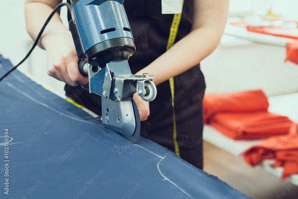 Cutting textile on a sewing manufacture Cutting textile on a sewing manufacture