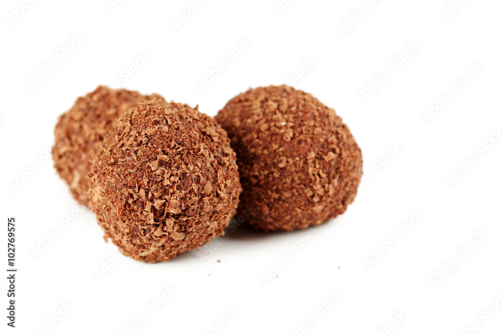 Sweet chocolate truffle isolated on a white Sweet chocolate truffle isolated on a white