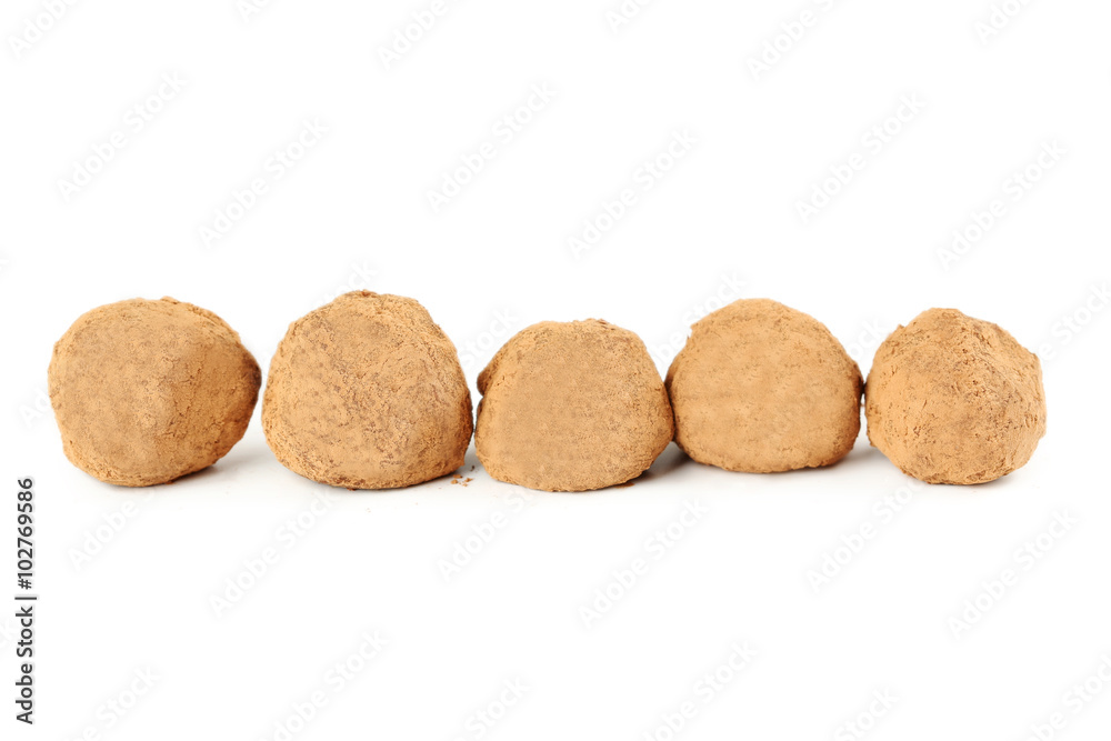 Sweet chocolate truffle isolated on a white