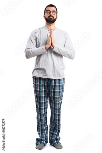 Man in pajamas pleading