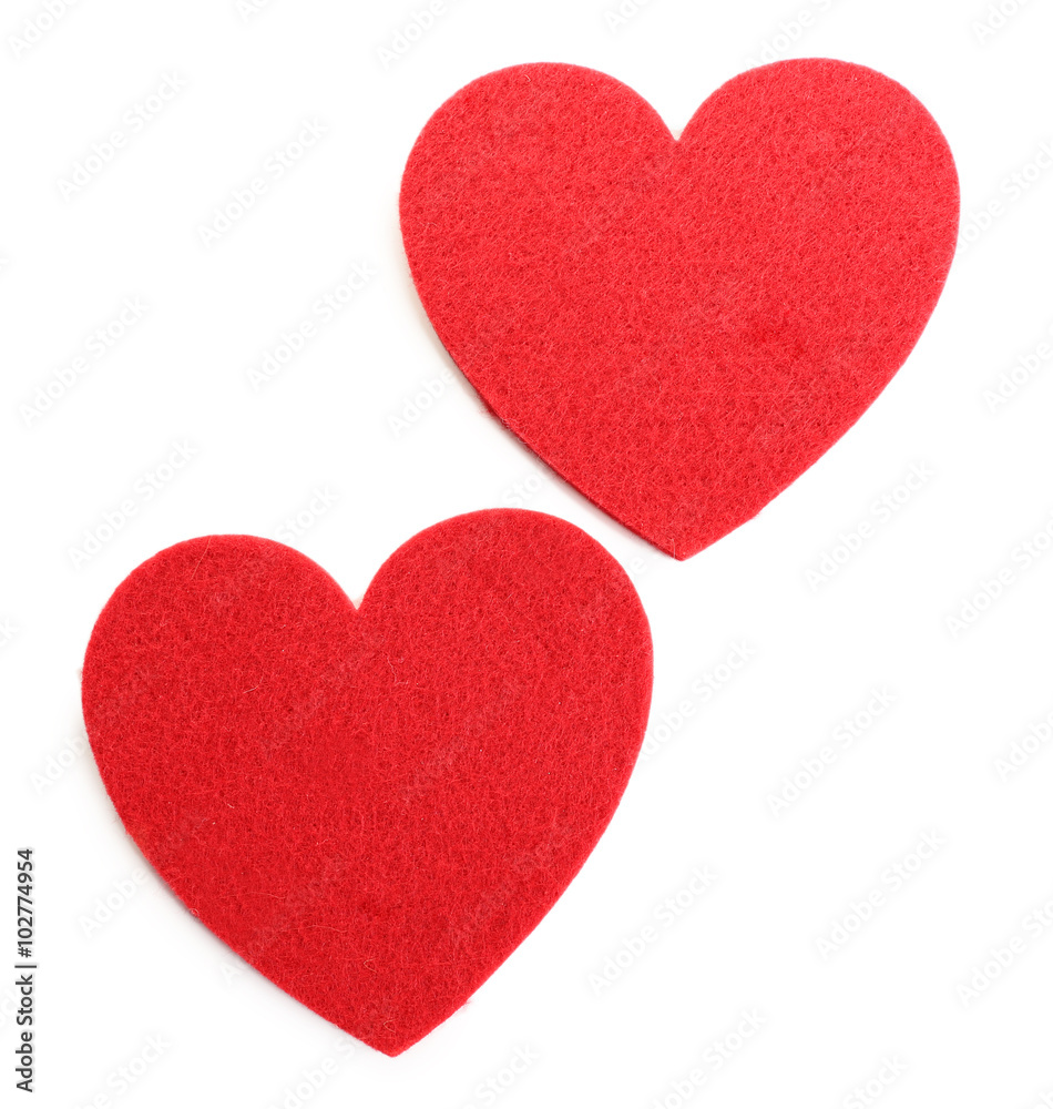 Red felt hearts isolated on white background