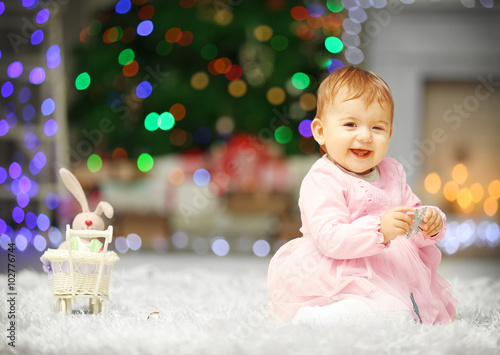 Sweet baby girl with snowfl...