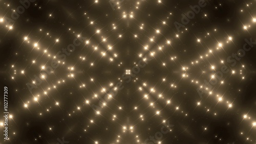 Fractal Golden kaleidoscopic background with brilliant particles. Disco spectrum lights concert spot bulb.