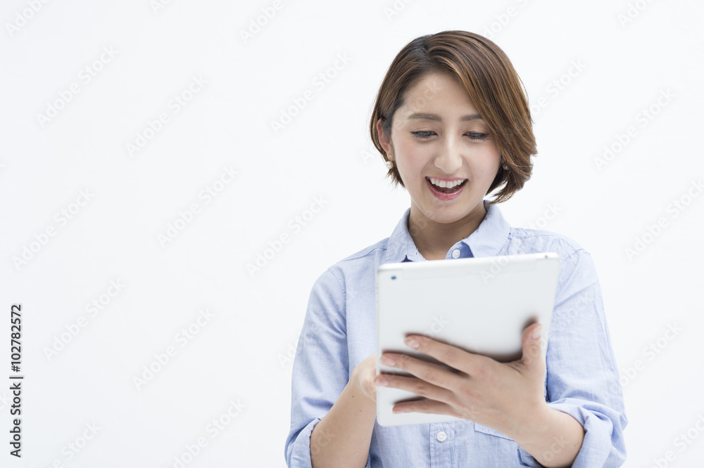 Women are laughing to see the tablet Women are laughing to see the tablet