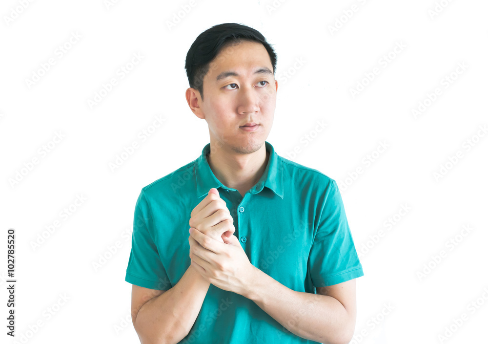 Serious Asian man thinking about something on isolated white background Serious Asian man thinking about something on isolated white background