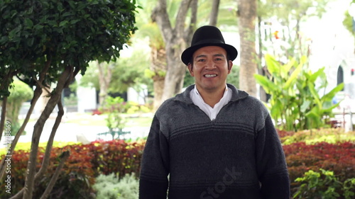 Portrait shot of an indigenous Saraguro man wearing traditional hat in the province of Loja and the country of Ecuador.