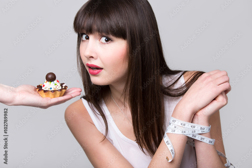 Dieting woman got caught while trying to eat cake Dieting woman got caught while trying to eat cake