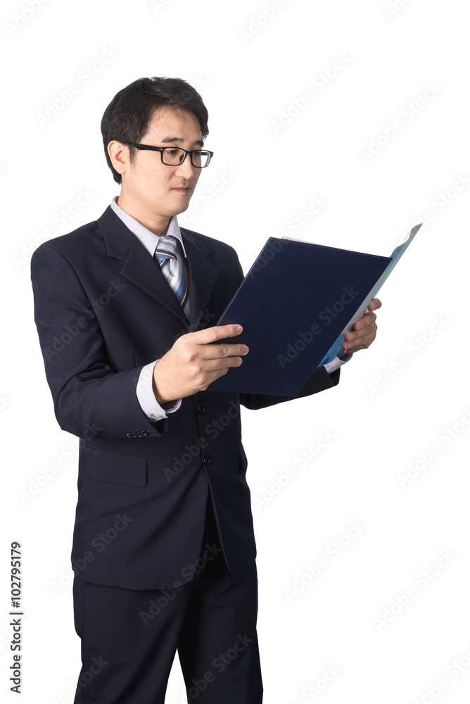 Asian businessman reading important information in file folder, Asian businessman reading important information in file folder,