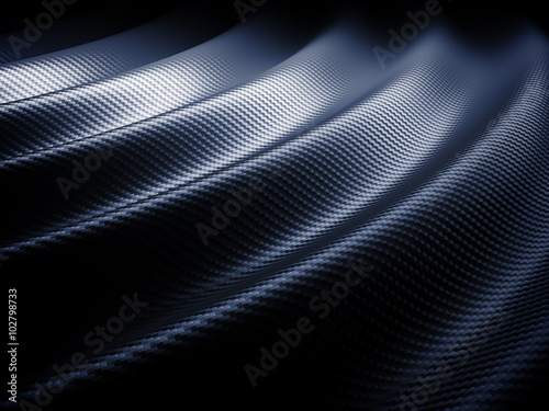  carbon fiber textured background, wave geometry. concept of resistende and technological material. nobody around. © tiero