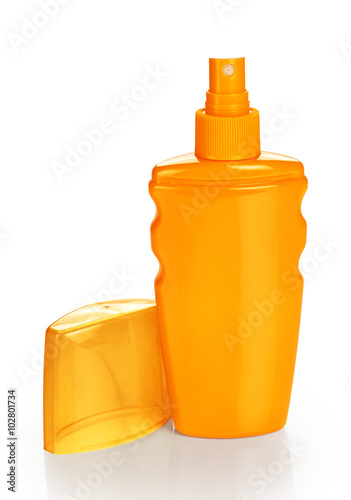 Bottle with sunscreen spray isolated on white background.