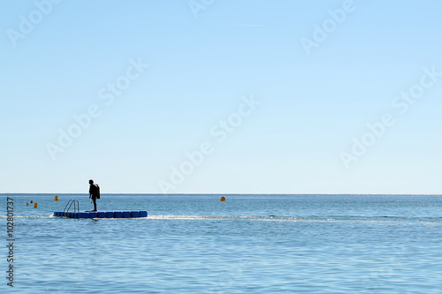 Принти на полотні Skin-diver on float board