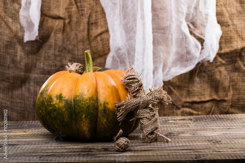 Halloween doll with pumpkin photo