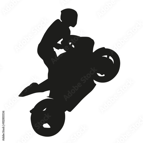 Motorcycle racing vector silhouette, wheelie photo