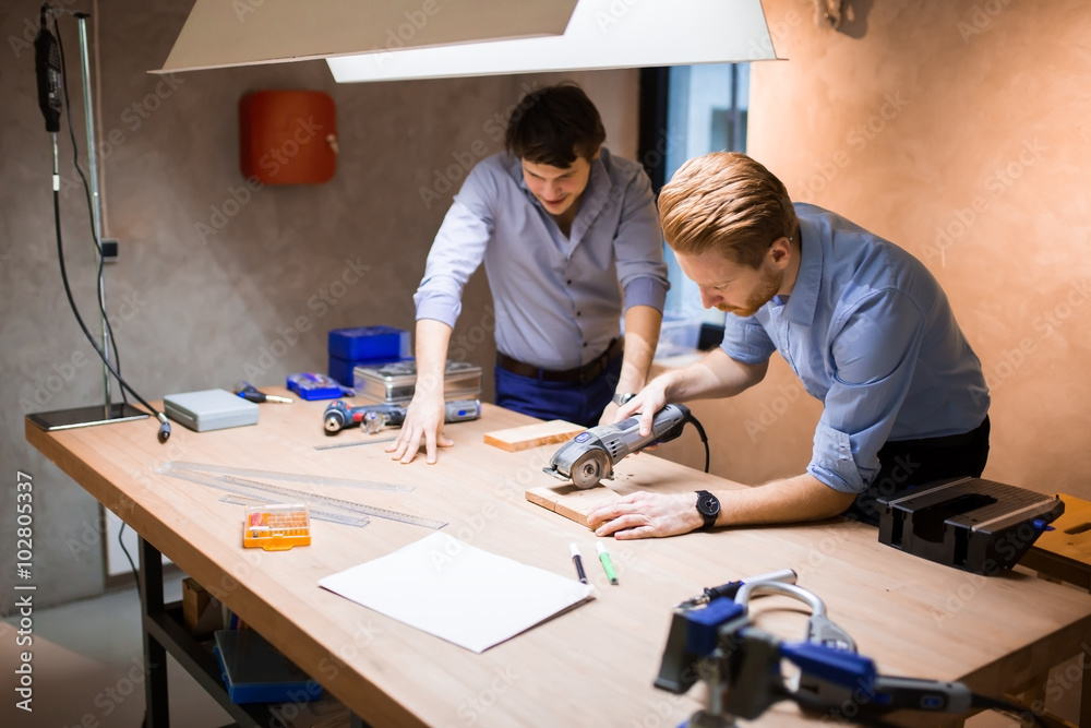 Two designers working together Two designers working together