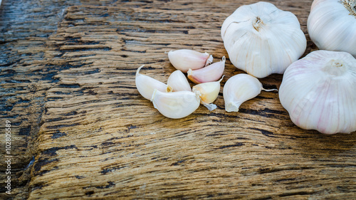 garlic on vintage wooden background