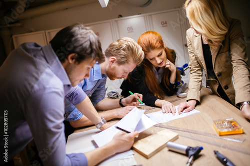 Group of creative designers brainstorming