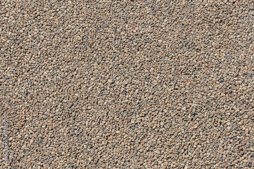 Texture of brown pea gravel rock, street background, Tokyo, japan.