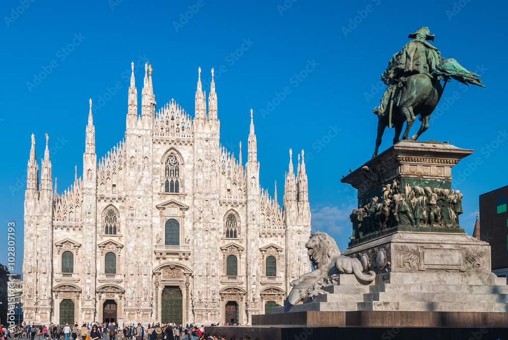MILAN, ITALY - MAY 18, 2010: Milan Cathedral and the statue of Vittorio Emanuele II