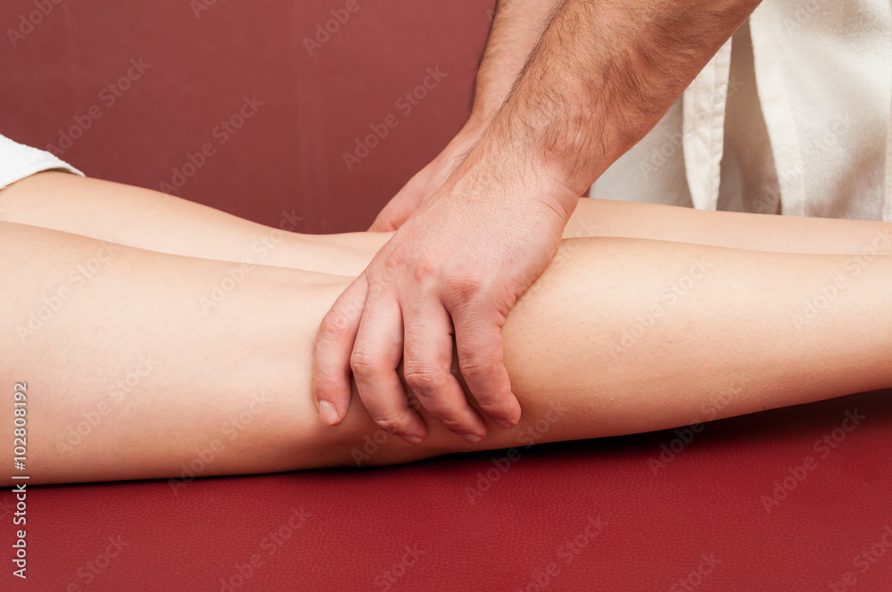Young female legs getting a relaxing massage Young female legs getting a relaxing massage