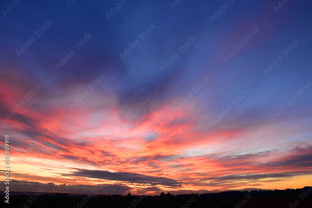 Vivid sky illuminated by the sunset.