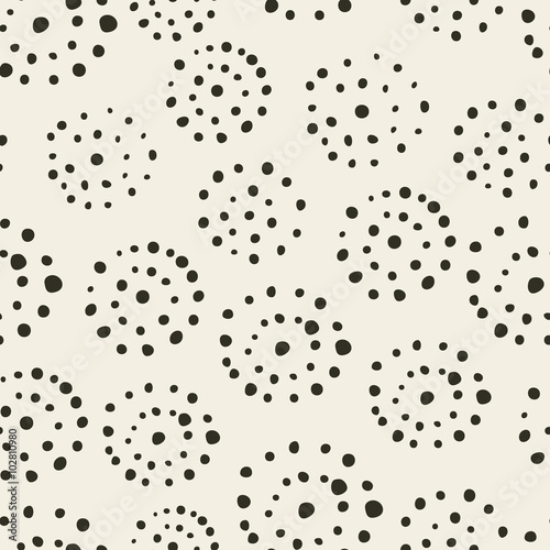 Retro style seamless pattern with circles made from dots. Hand drawn abstract vector illustration