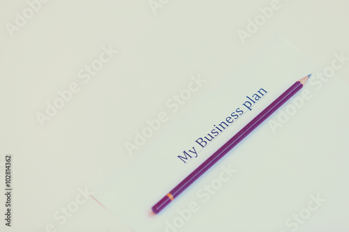 Paper with words Business plan