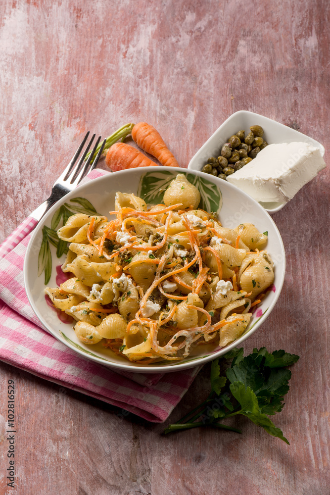 pasta with carrot capers and soft cheese