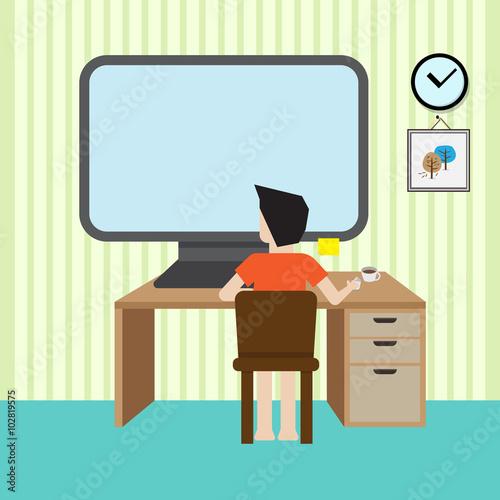 man sit infront of computer desktop with blank screen