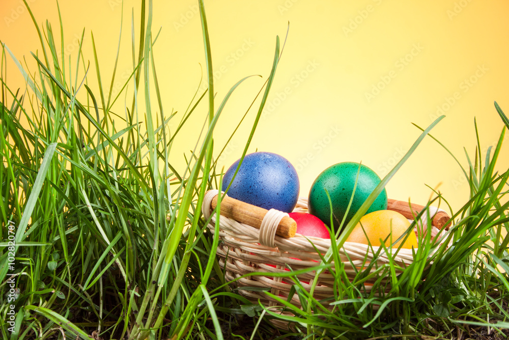 Easter basket with colored eggs