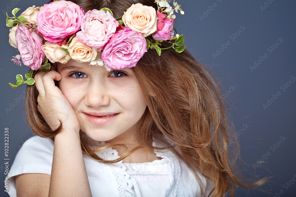 Beautiful little girl with bunch, studio 