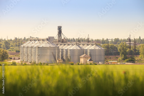 panorama of modern metal silo in countryside photo