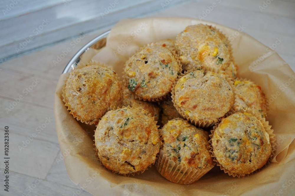 Basket of homemade corn savory muffins Basket of homemade corn savory muffins