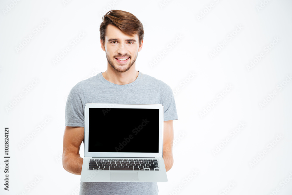 Man showing blank laptop computer screen Man showing blank laptop computer screen