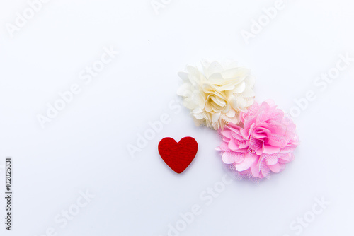 Red heart and flower isolated on white background