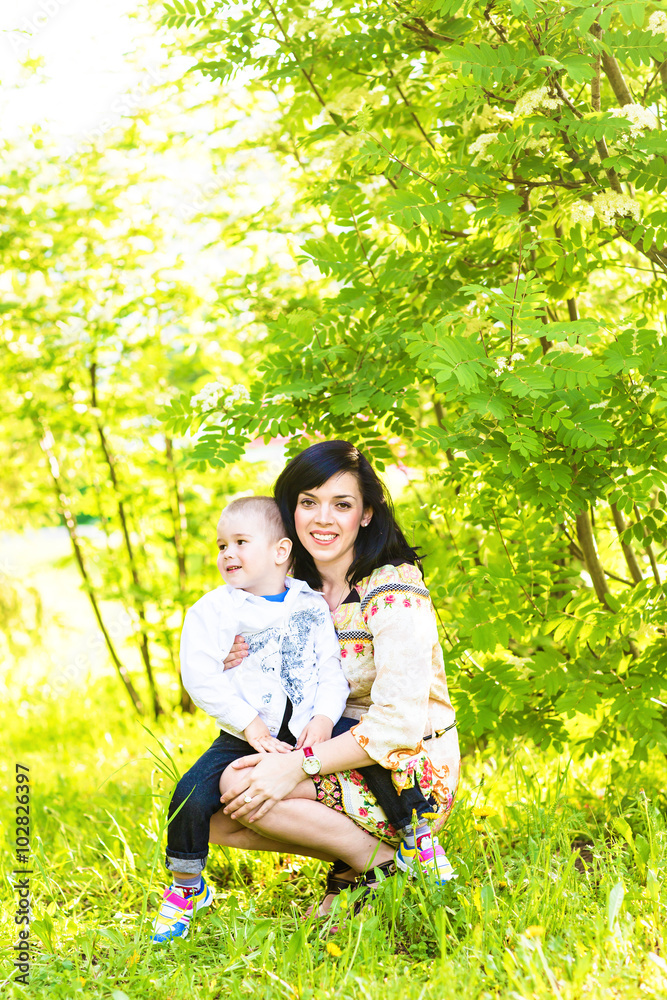 Fototapeta premium Spring portrait of mother and son on Mother's Day