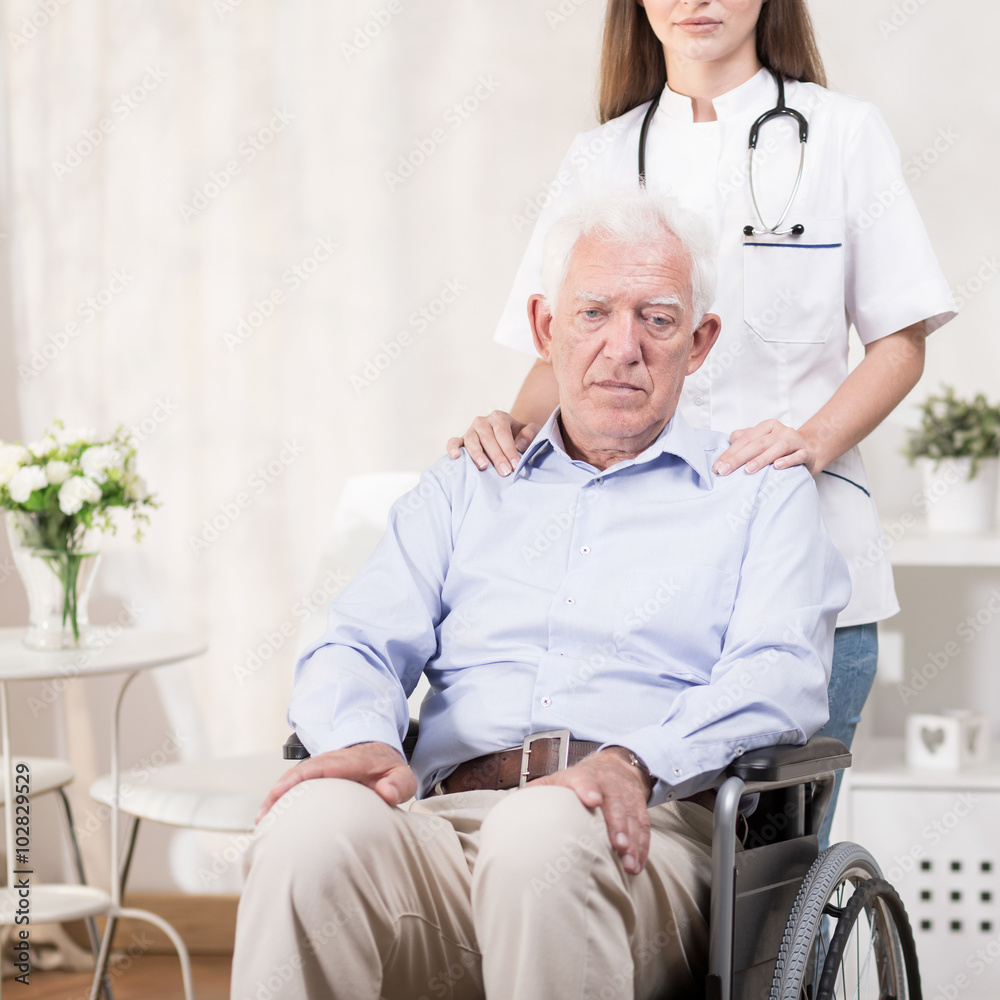 Fototapeta premium Sad elderly man on wheelchair