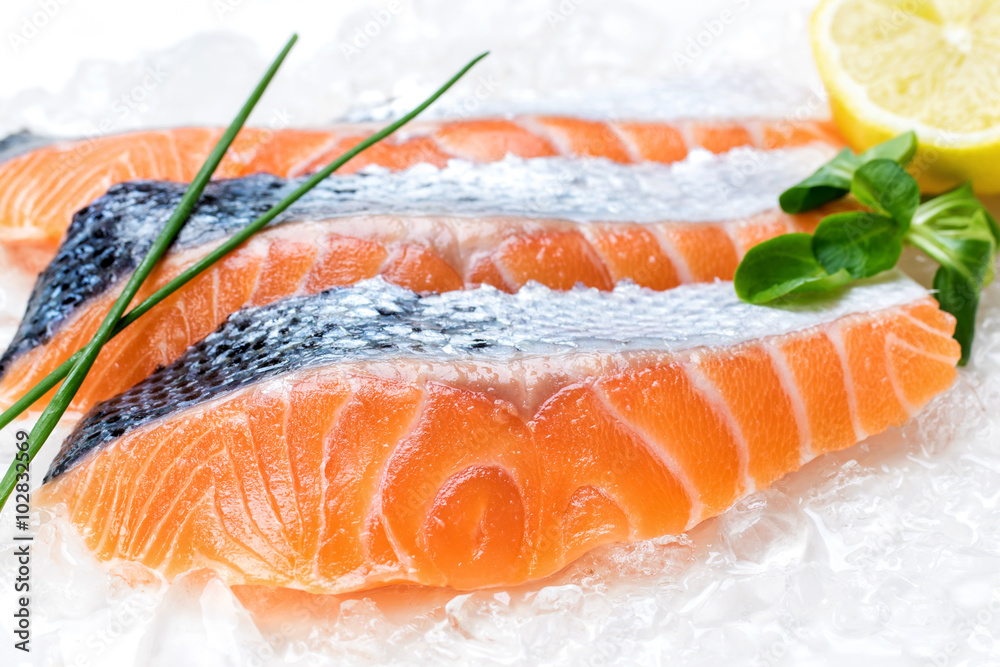 Fresh salmon filets on ice.