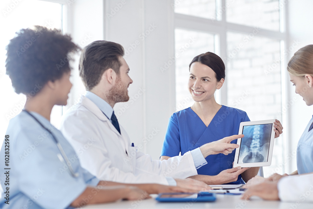 group of happy doctors meeting at hospital office group of happy doctors meeting at hospital office