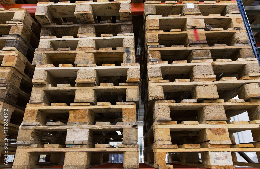 wooden cargo pallets storing at warehouse shelves wooden cargo pallets storing at warehouse shelves