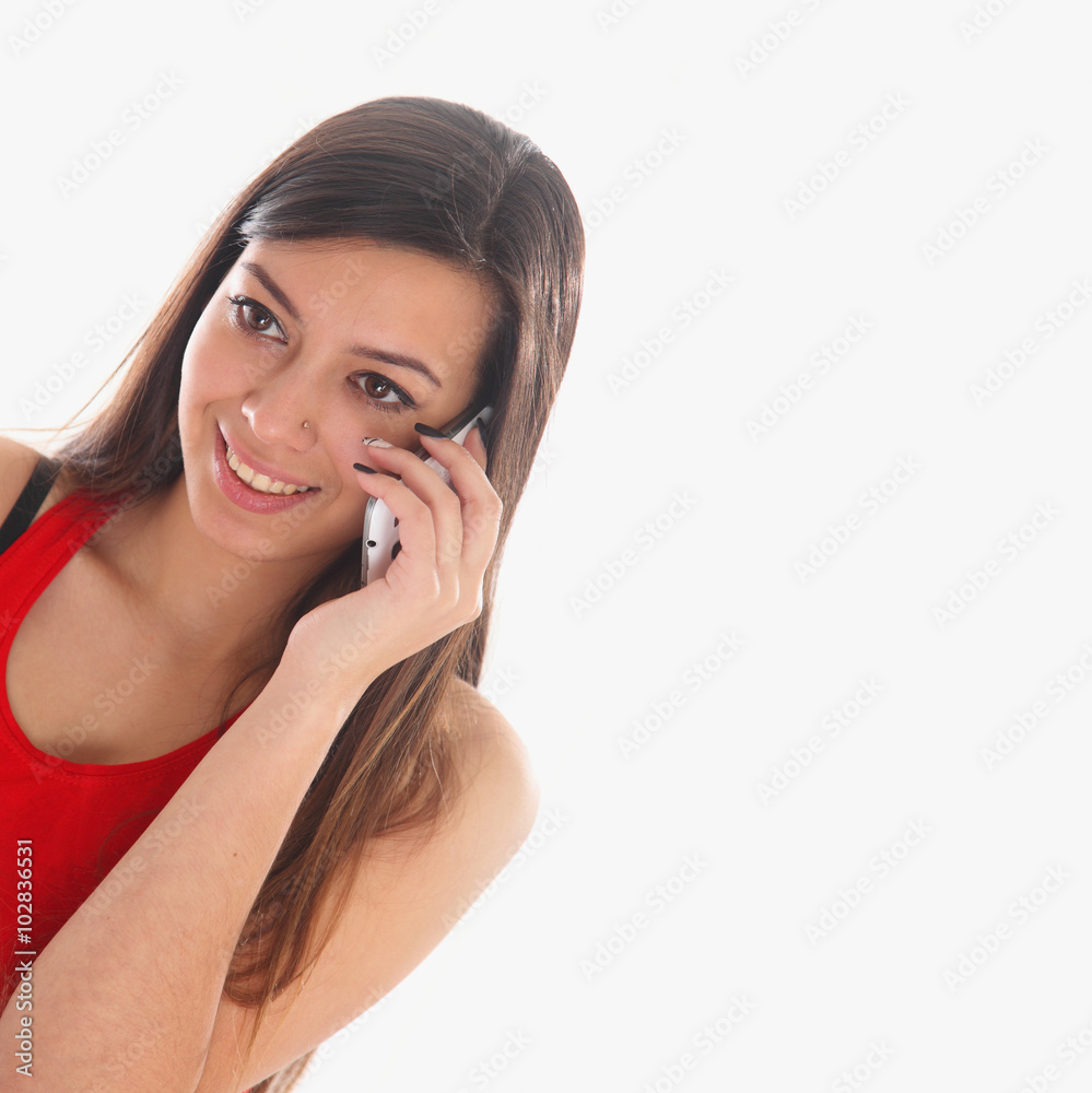 Beautiful young happy woman smiling during a phone call Beautiful young happy woman smiling during a phone call