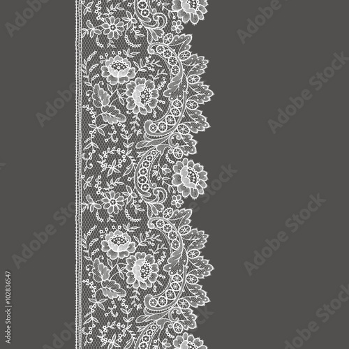 Lace ribbon. Vertical seamless pattern.