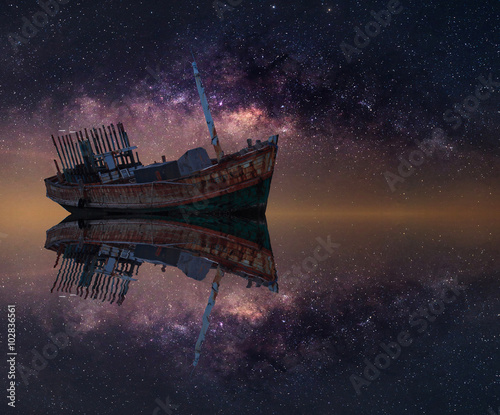 Fototapeta Naklejka Na Ścianę i Meble -  The wrecked ship under starry night with clearly  milky way