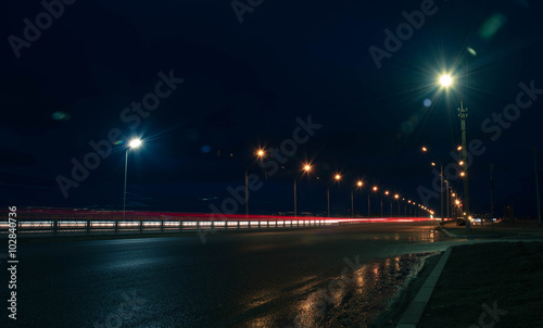 moving car with blur light through city night