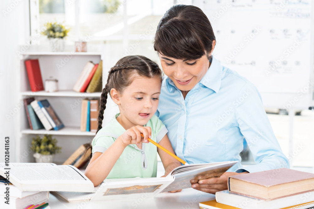 Business woman and daughter while working day