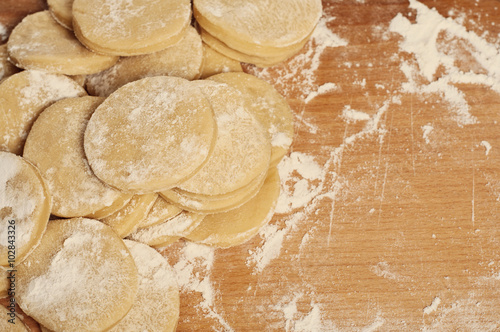 raw homemade cookies on a wooden board