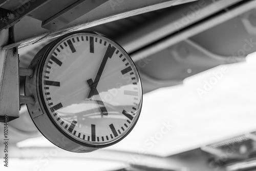 A clock at a train station photo